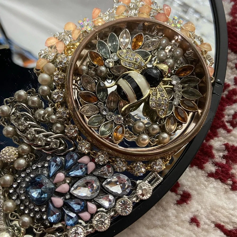 Hand Jeweled Mirror. Measurers Approximately 10 inches.